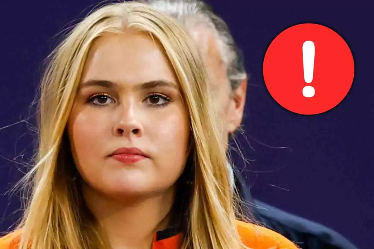 Amalia of Orange with a serious expression and a red circle with a white exclamation mark in the background