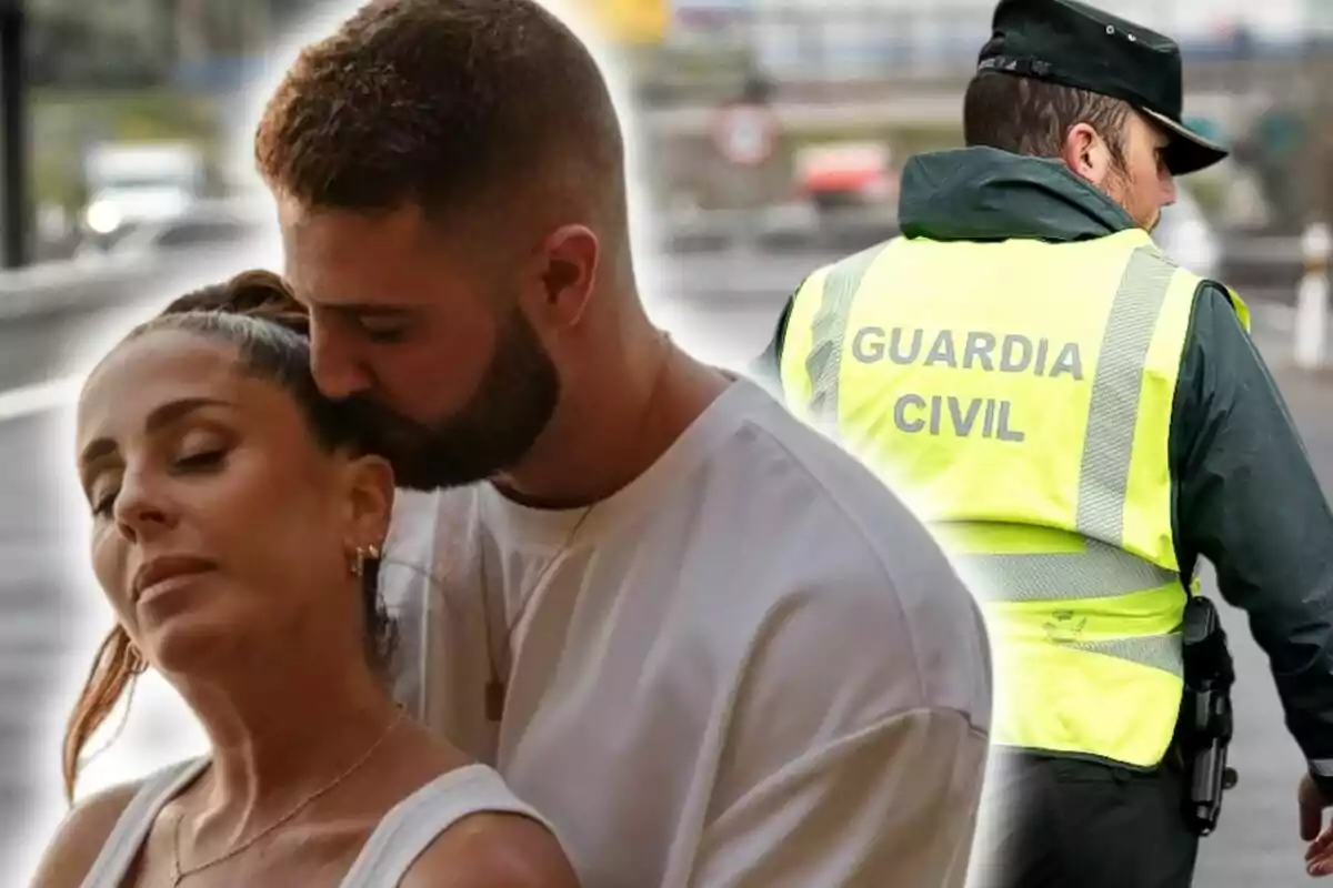 Una parella abraçant-se amb tendresa -que són David Rodríguez i Anabel Pantoja- mentre un agent de la Guàrdia Civil està d'esquena a l'escena.