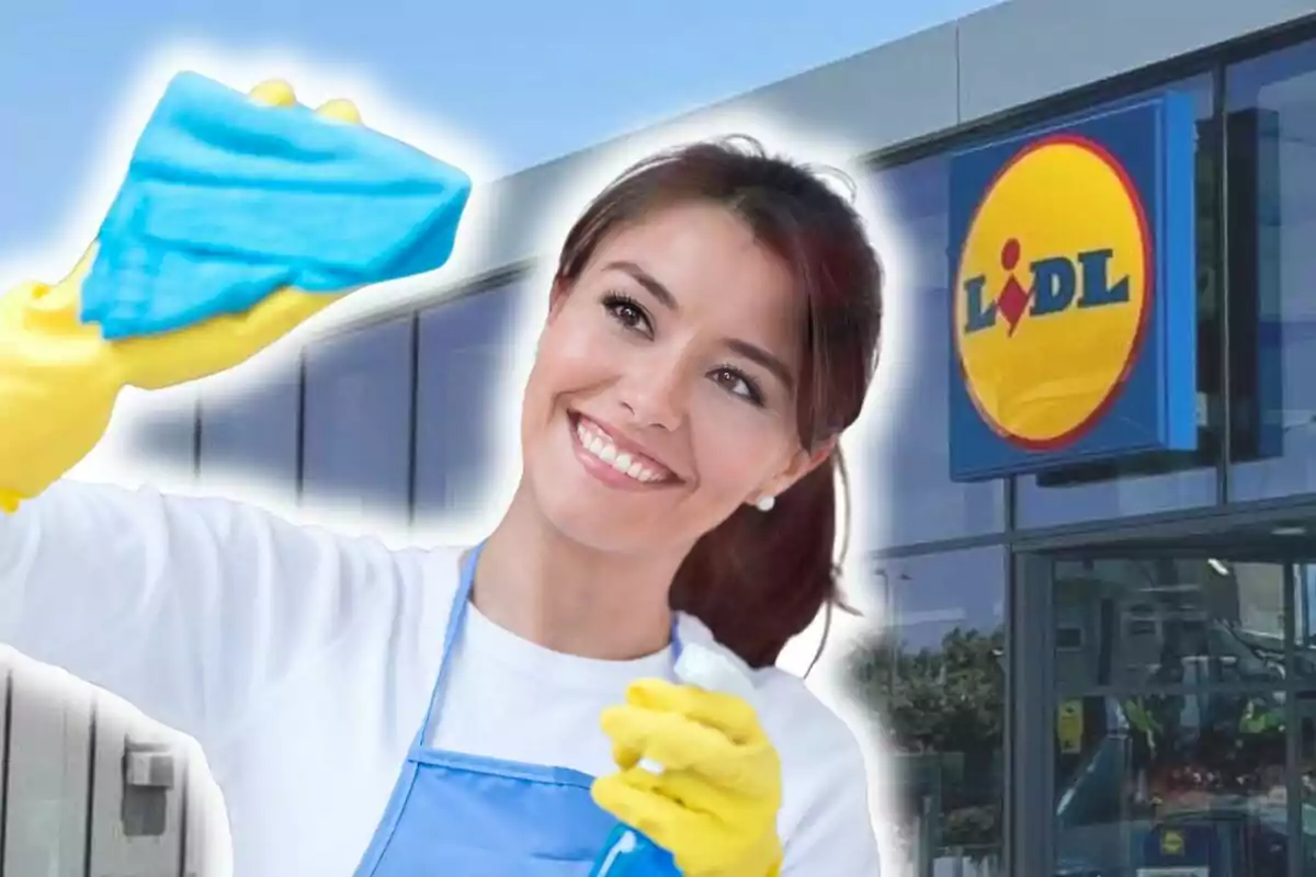 A smiling person with yellow gloves cleans a window in front of a Lidl store.