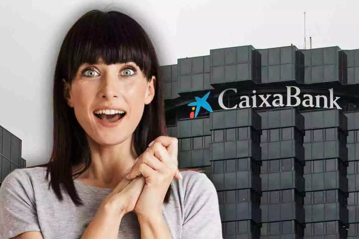Dona amb expressió de sorpresa i alegria davant d’un edifici de CaixaBank Dona amb expressió de sorpresa i alegria davant d’un edifici de CaixaBank