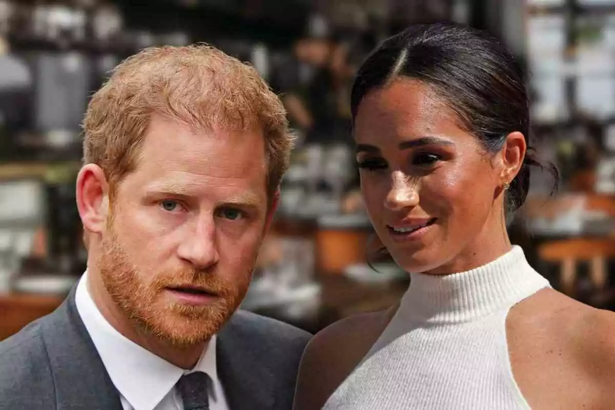 Close-up of serious Meghan Markle and Prince Harry smiling on a blurred restaurant background.