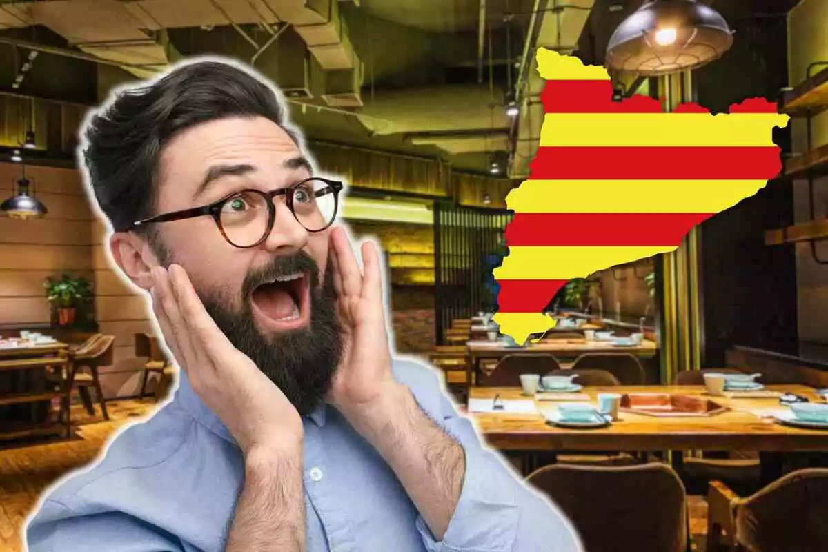 Un hombre con expresión de sorpresa en un restaurante con un mapa de Cataluña con franjas rojas y amarillas en el fondo.