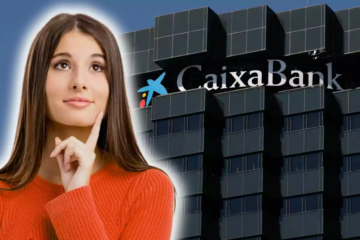 Dona pensativa amb un edifici de CaixaBank de fons.