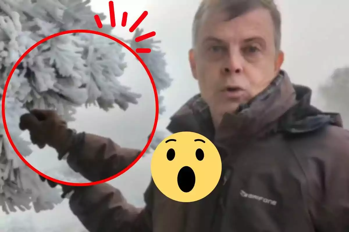 Un hombre con chaqueta marrón está junto a un árbol cubierto de nieve, con un círculo rojo destacando su mano y un emoji sorprendido en el centro.