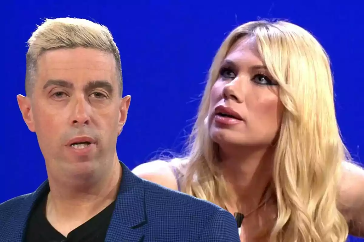 Javi and Vanessa on a television show with a blue background.