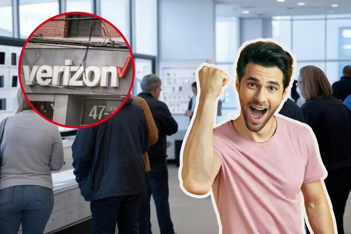 Una persona emocionada levanta el puño mientras un grupo de personas espera en una tienda con un logotipo de Verizon en un círculo rojo.