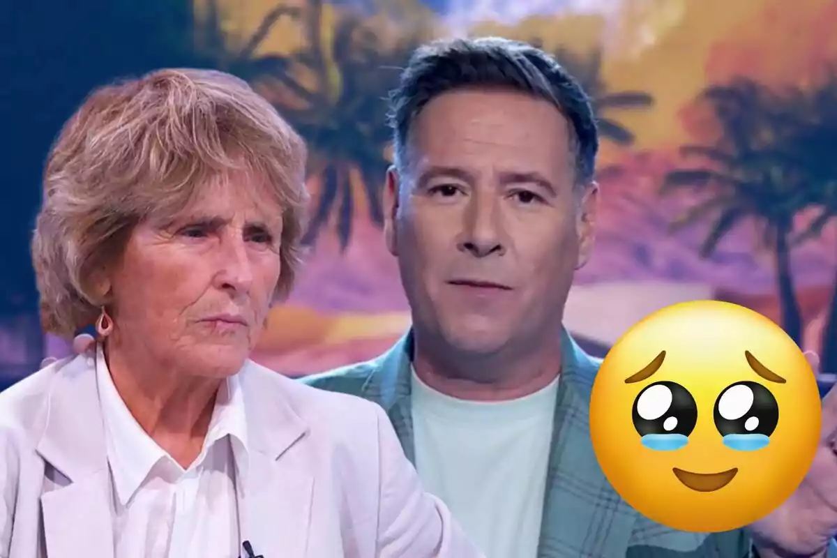 Mercedes Milá i Carlos Latre en un programa de televisió amb un emoji de cara plorant superposat.