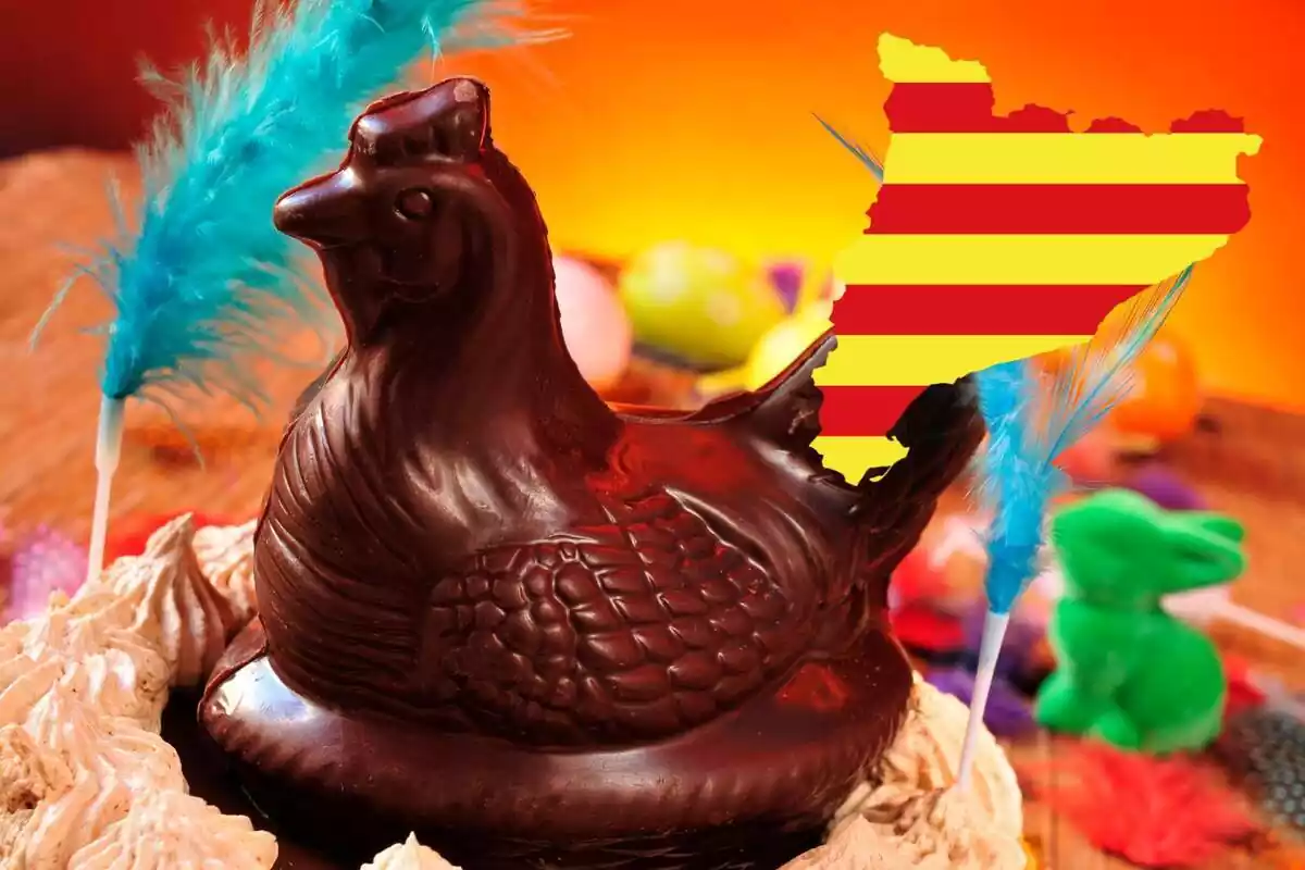 Muntatge d´una mona de Pasqua amb plomes i una figura de xocolata en forma de gallina i la bandera de Catalunya