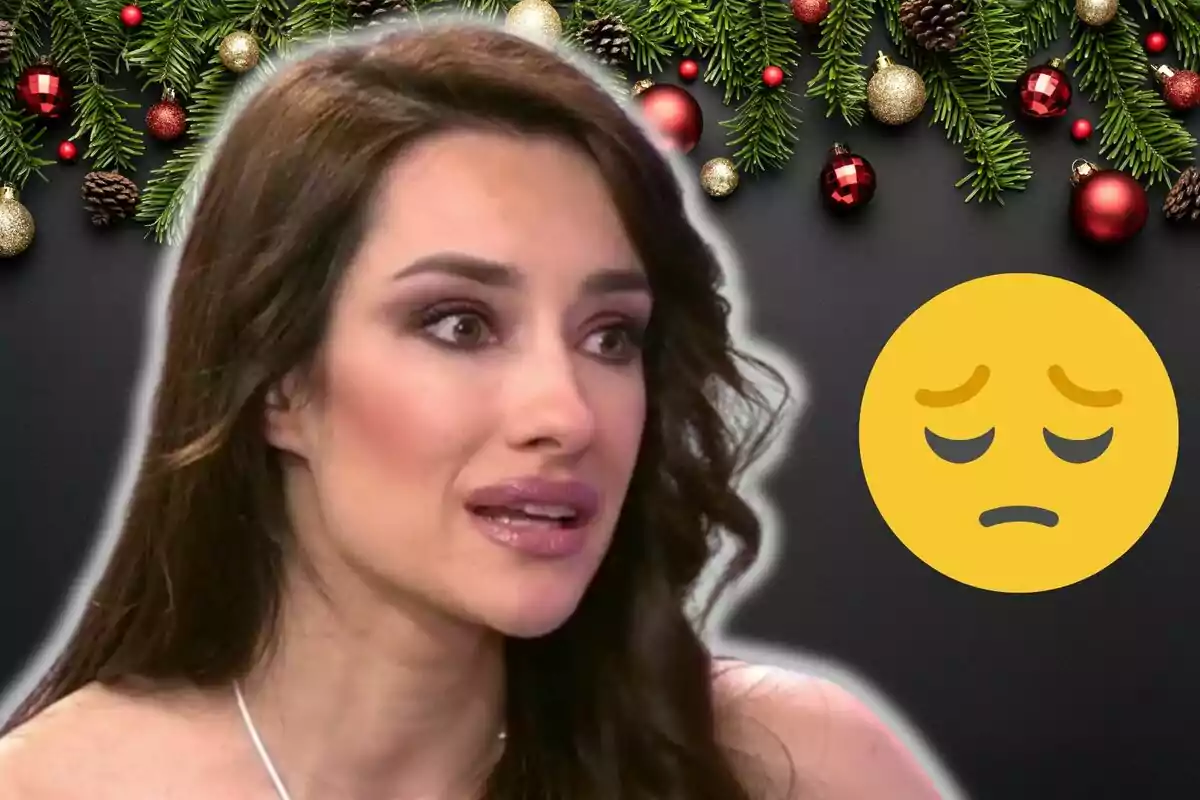 Adara Molinero amb expressió seriosa amb un emoji trist i decoració nadalenca.