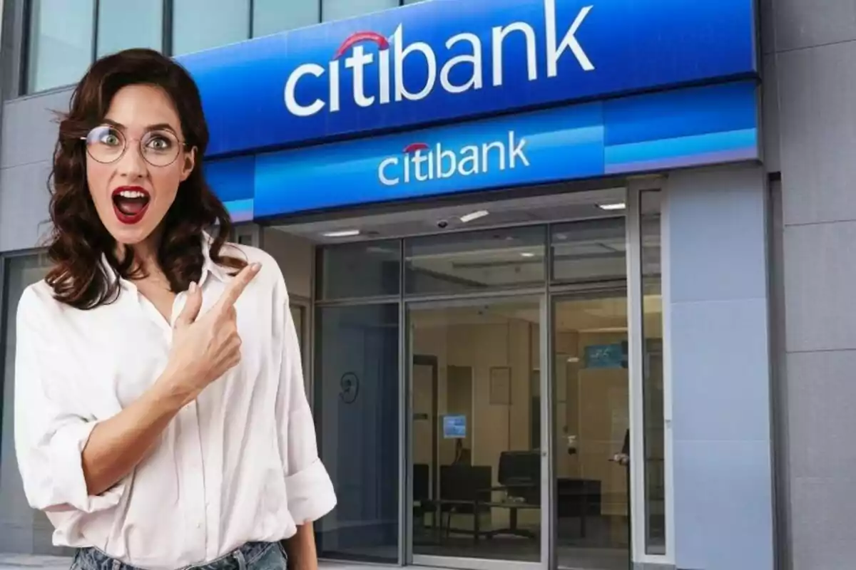 A woman with a surprised expression pointing toward the entrance of a Citibank branch.