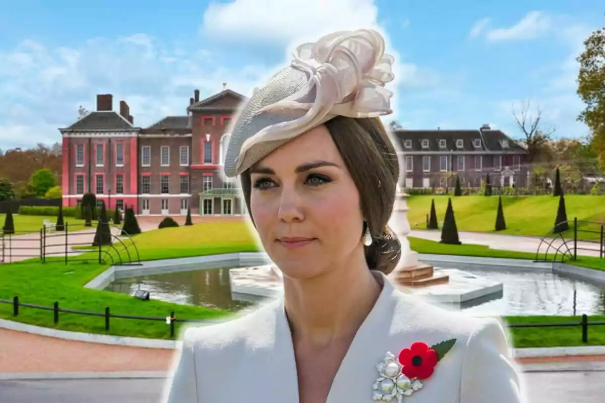 Kate Middleton in an elegant hat and a red flower brooch on her white coat, posing in front of a historic building with well-kept gardens and a fountain.