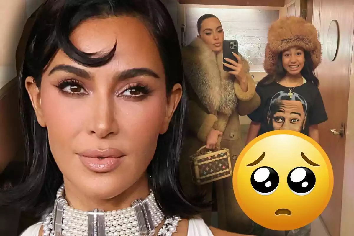 Kim Kardashian con un collar de perlas y un peinado elegante aparece en primer plano mientras en el fondo se ve a ella tomándose una selfie con un abrigo de piel y North West con un sombrero grande y una camiseta gráfica; un emoji de cara triste está superpuesto en la imagen.