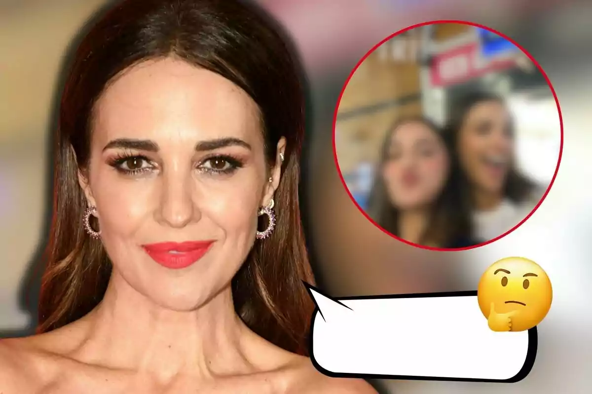 Paula Echevarría with red lips, wearing shiny earrings, with a blurry frame of two people in the background and a thinking emoji in an empty speech bubble.