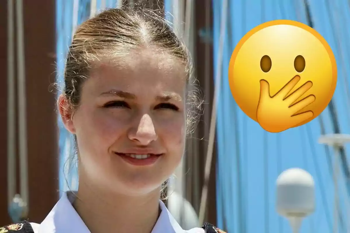 Princess Leonor smiling outdoors with a surprised emoji next to her.