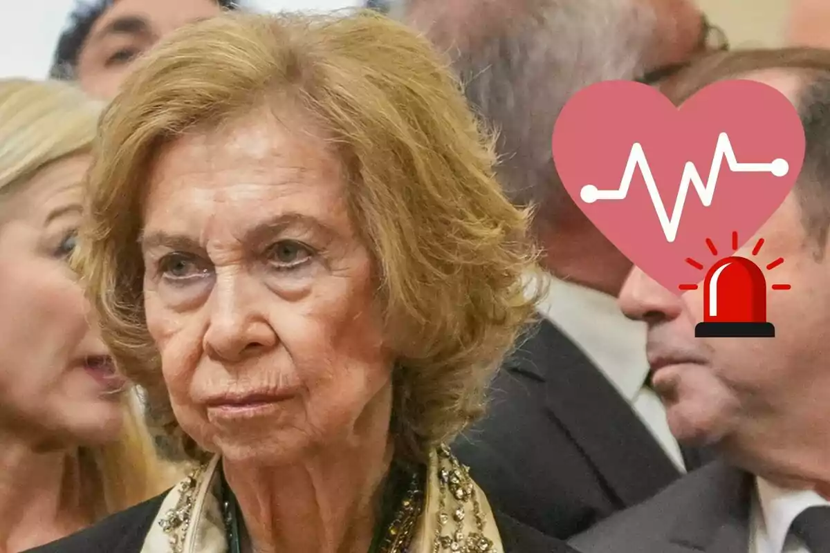 Queen Sofía with a serious expression at an event, with a heart and alert graphic overlay.
