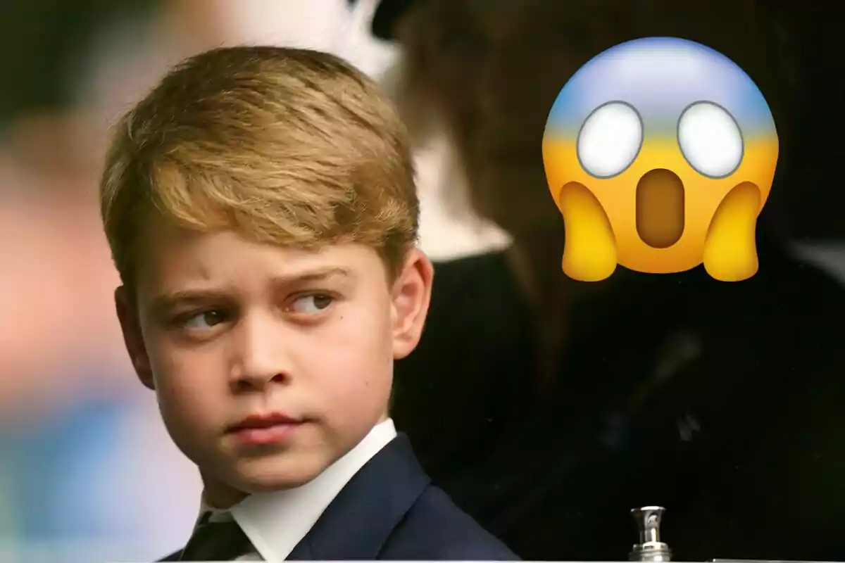 El príncep George amb expressió seria amb un emoji sorprès.