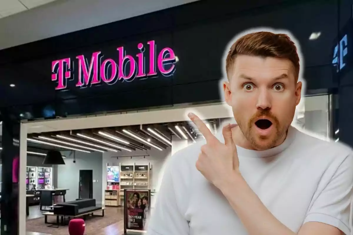 Hombre sorprendido señalando una tienda de T-Mobile.