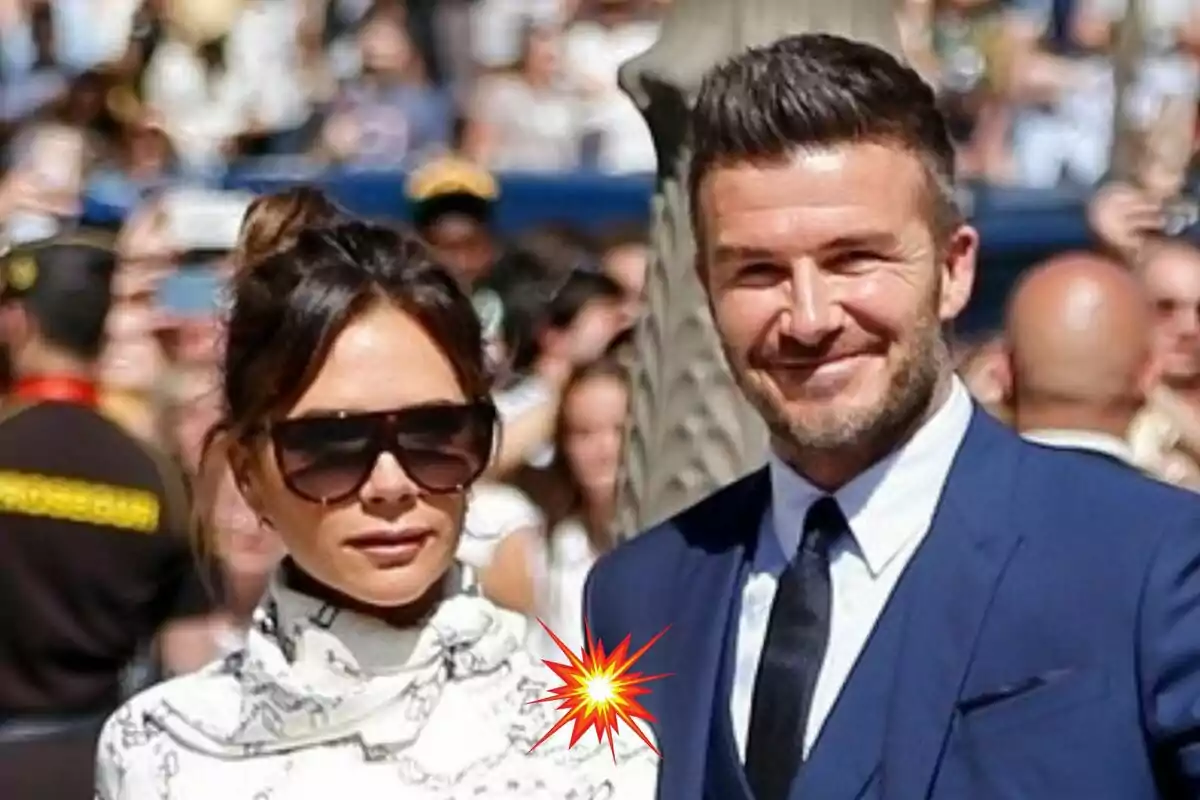 Victoria and David Beckham, elegantly dressed, pose outdoors at a crowded event.