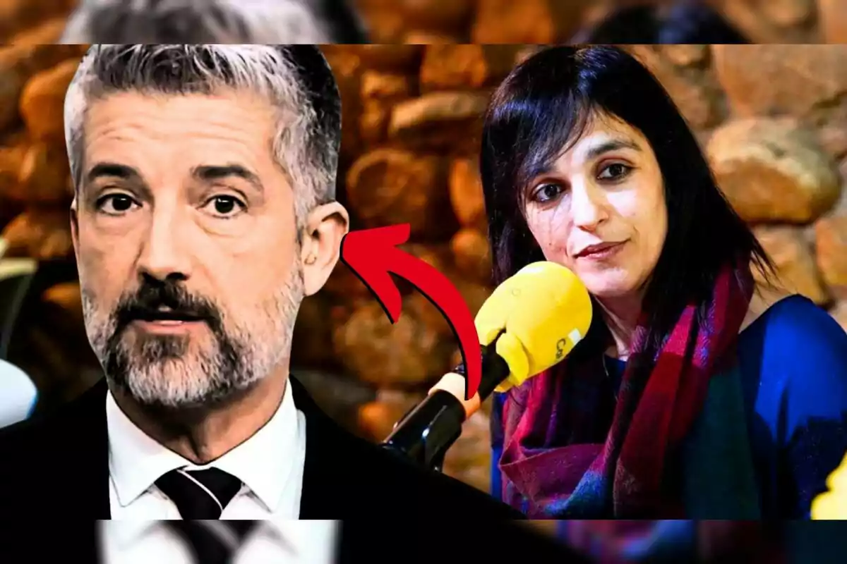 A man with a gray beard and hair appears in the foreground while a woman with dark hair holds a yellow microphone in the background, with a red arrow pointing at the man.