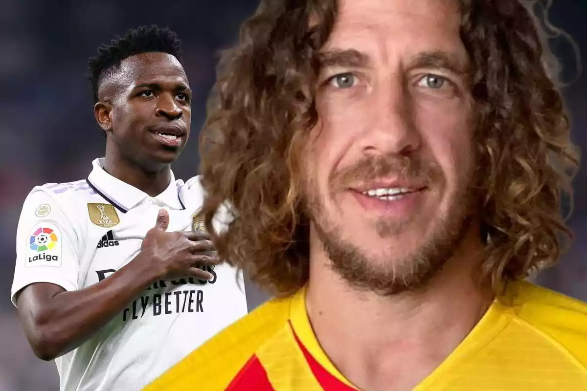 Carles Puyol en primer pla amb Vinícius Júnior al fons tocant l?escut del Reial Madrid