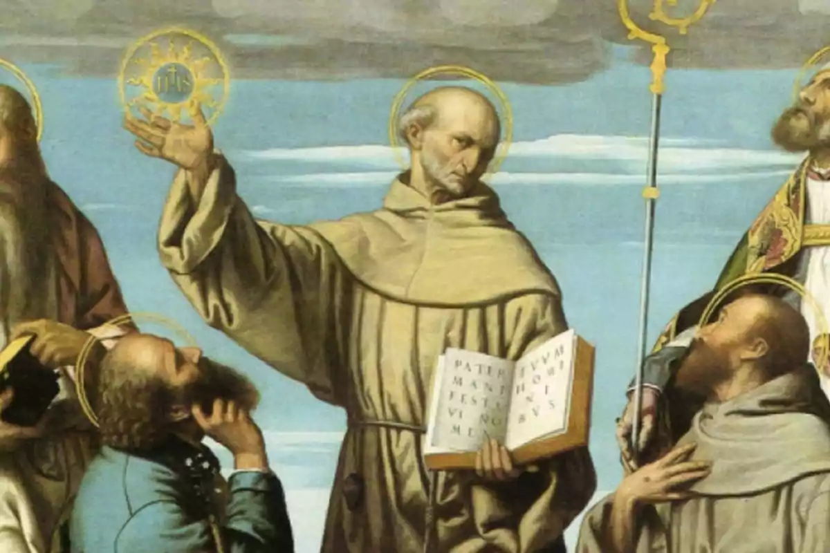 Un grup de figures religioses amb halos daurats envolta un home al centre que sosté un llibre obert i un disc daurat amb les lletres IHS, mentre un altre home sosté un bastó decoratiu.