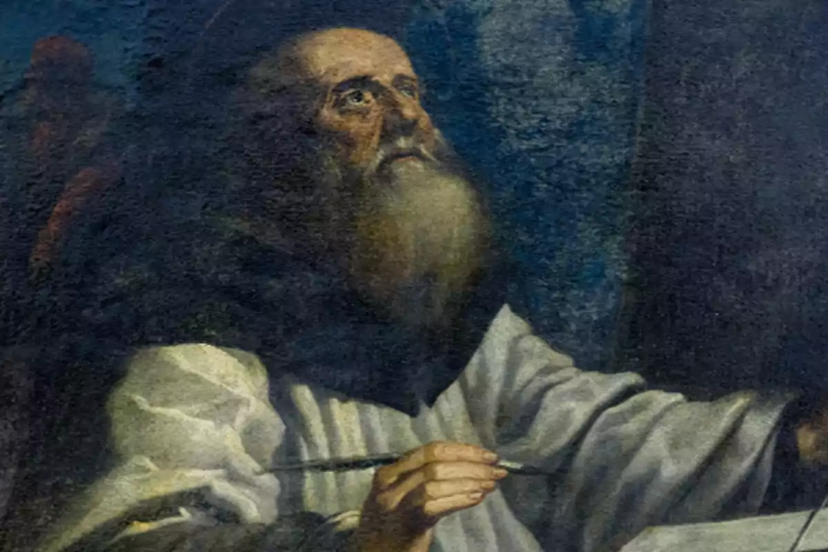 Un home amb barba i túnica blanca sosté un pinzell mentre mira cap amunt en una pintura antiga. Un home amb barba i túnica blanca sosté un pinzell mentre mira cap amunt en una pintura antiga.