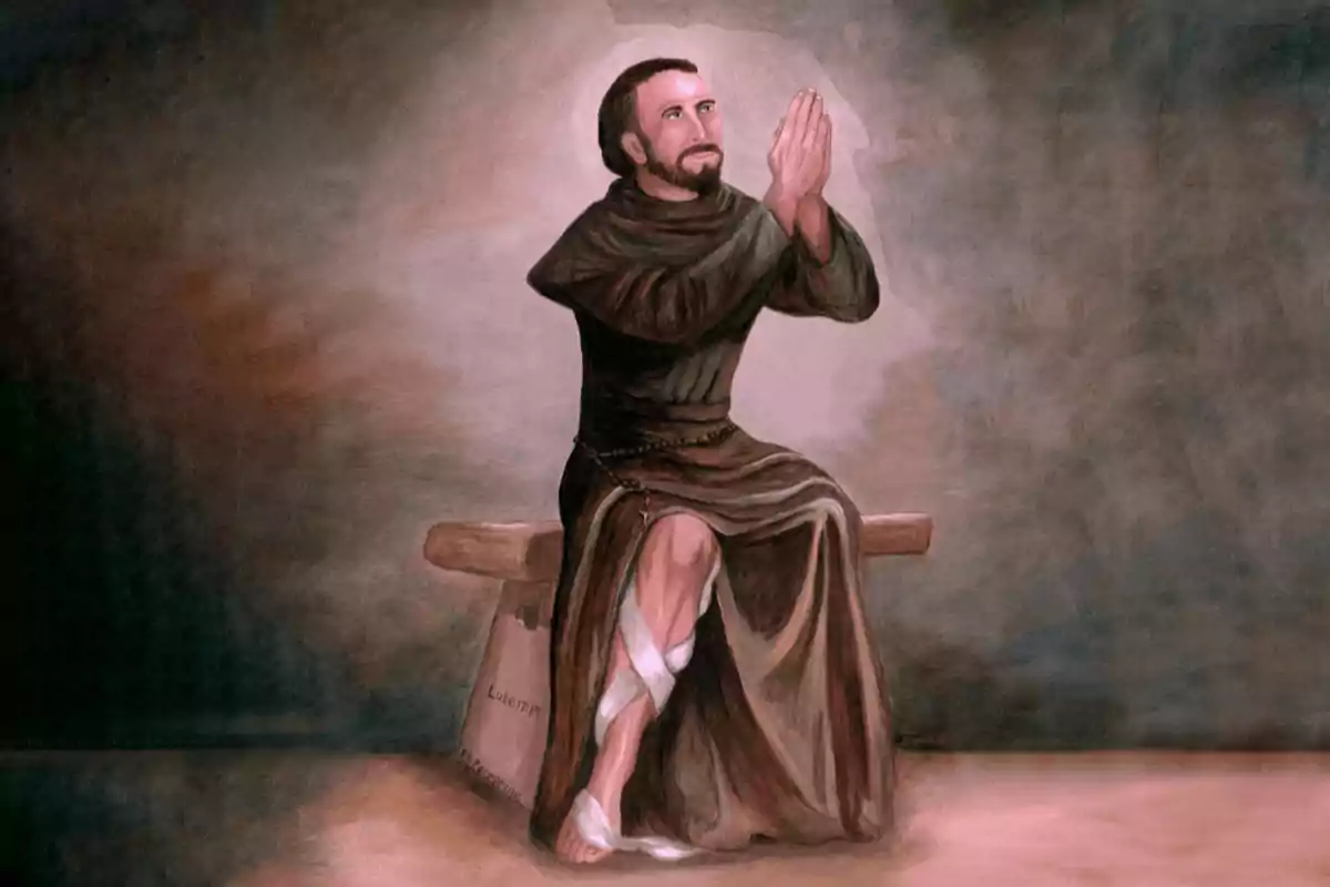 Un home amb hàbit religiós està agenollat sobre un banc de fusta, amb les mans juntes en actitud de pregària i una expressió de devoció al seu rostre, mentre un halo de llum l'envolta en un fons de tons foscos. Un home amb hàbit religiós està agenollat sobre un banc de fusta, amb les mans juntes en actitud de pregària i una expressió de devoció al seu rostre, mentre un halo de llum l'envolta en un fons de tons foscos.