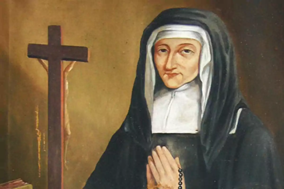 Una pintura d'una monja amb hàbit negre i blanc resant davant d'un crucifix. Una pintura d'una monja amb hàbit negre i blanc resant davant d'un crucifix.