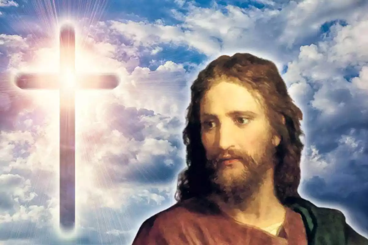 Retrat de Jesucrist amb el fons del cel i una creu brillant