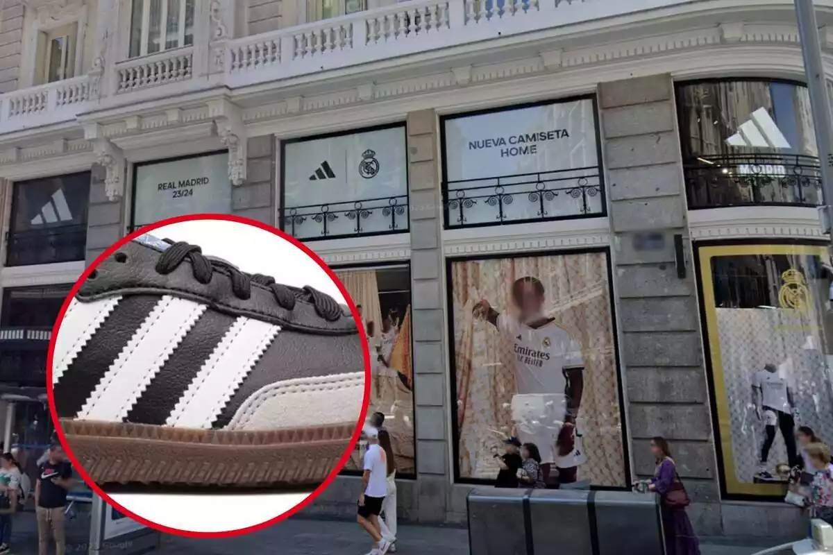 Detall sabatilla adidas negra en un cercle vermell sobre fons façana Adidas Madrid