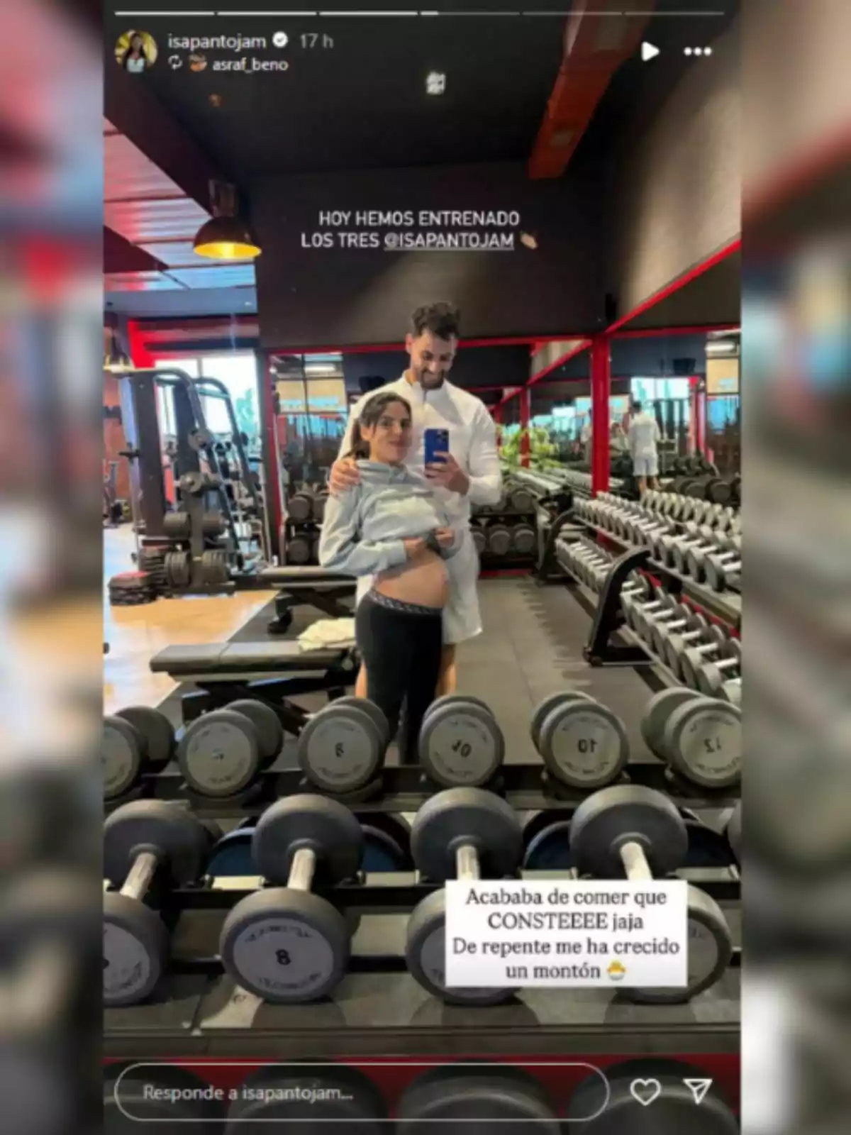 Isa Pantoja and Asraf Beno take a selfie at the gym in front of a mirror, surrounded by weights and training equipment. Isa Pantoja and Asraf Beno take a selfie at the gym in front of a mirror, surrounded by weights and training equipment.