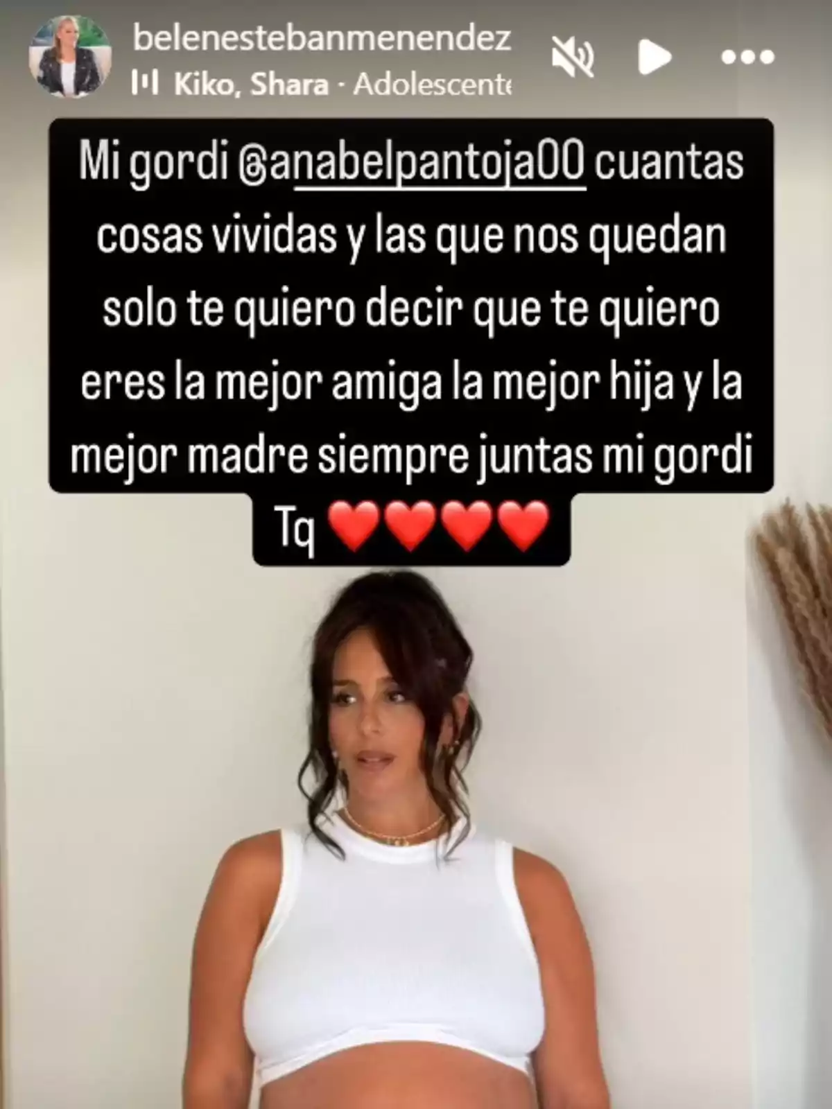 Belén Esteban's story featuring an image of Anabel Pantoja, pregnant in a white top, with a loving message at the top of the image.