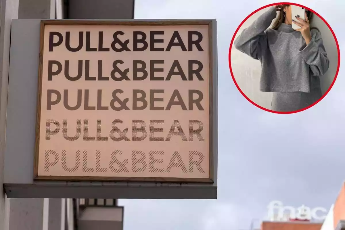 Botiga Pull and Bear i primer pla del jersei de punt gris