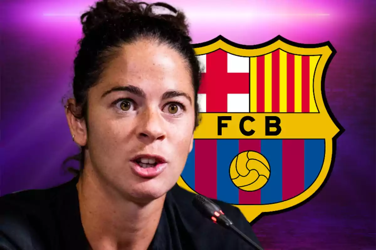 A person speaking in front of a microphone with the FC Barcelona crest in the background.