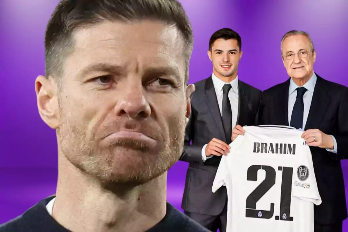 Primer pla d’un home amb expressió seriosa i al fons dues persones amb vestit sostenen una samarreta de futbol amb el nom Brahim i el número 21 sobre un fons morat.